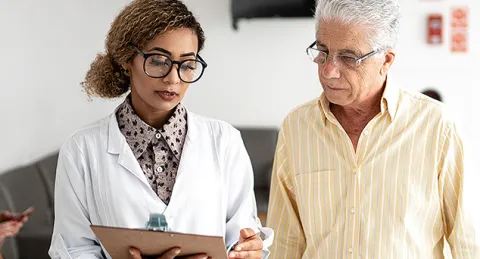 Nurse practitioner with an AGACNP master's certificate